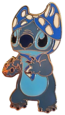 an enamel pin of stitch from lilo & stitch with a blue & white polka dot bra on his head