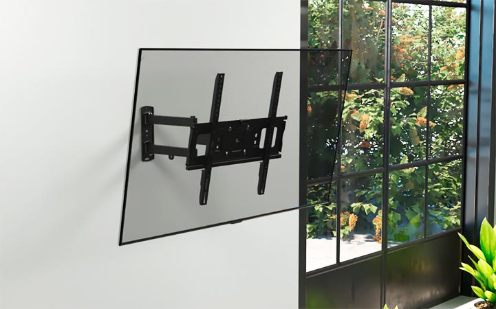 Soporte de pared articulado Xtech sosteniendo un televisor.