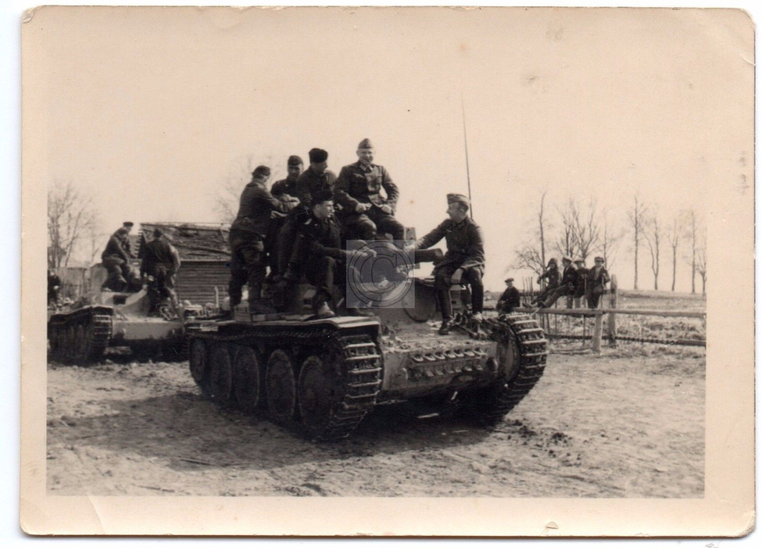 Panzertroops- Comrades on their Panzer 38T