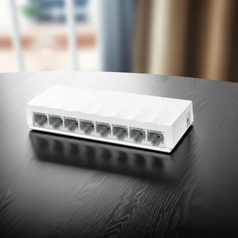 Vista superior do Switch TP-Link LS1008, com detalhes do acabamento e ventilação.
