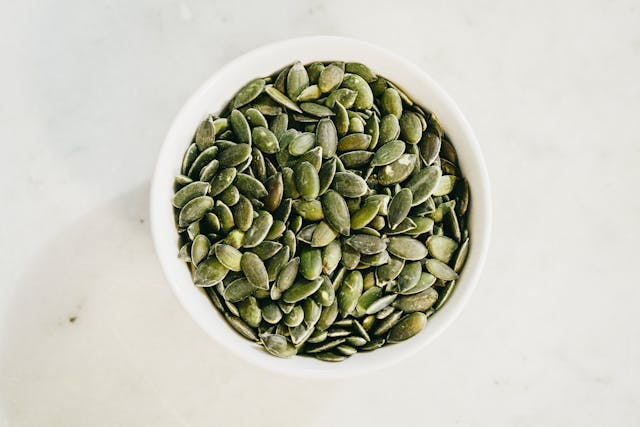 a bowl full of pumpkin seeds