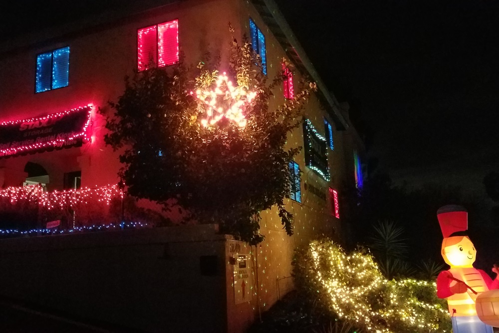 A closer view of the decorations at StaxUP Storage Alpine Boulevard for the 23rd Annual Alpine Village Christmas Parade of Lights.