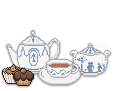 White and blue teapot set with two cupcakes