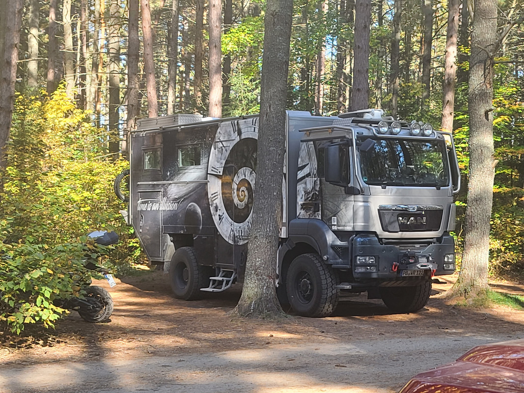 Man Expedition Truck pulled in at the next site over from mine. They didn't  get a second of peace with every camper in the area going over to ask the  same questions