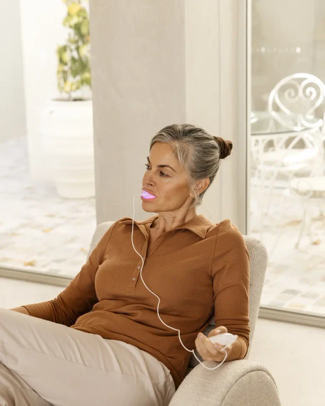 Relaxing at home during a Novaa Oral Care Pro session