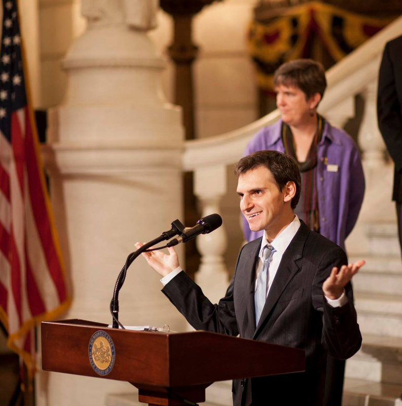 Jason speaking in the State Capitol