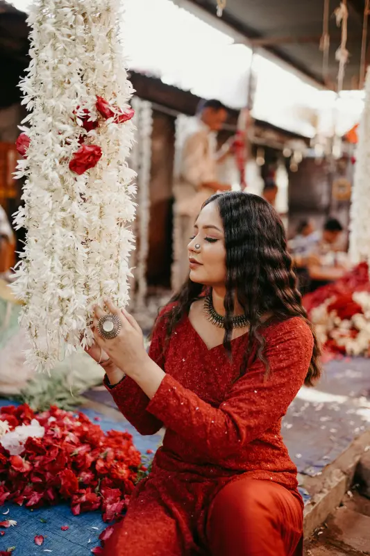Guest posing outside flower shop in Ujjain
