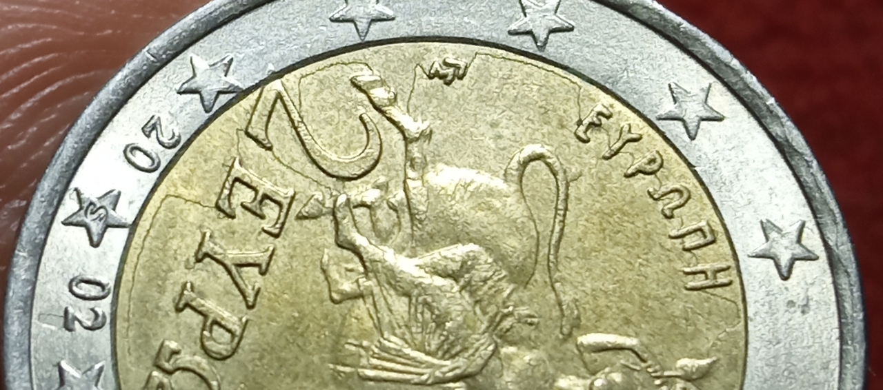 Dos euros de Grecia 2002 con error. Aaaaaa