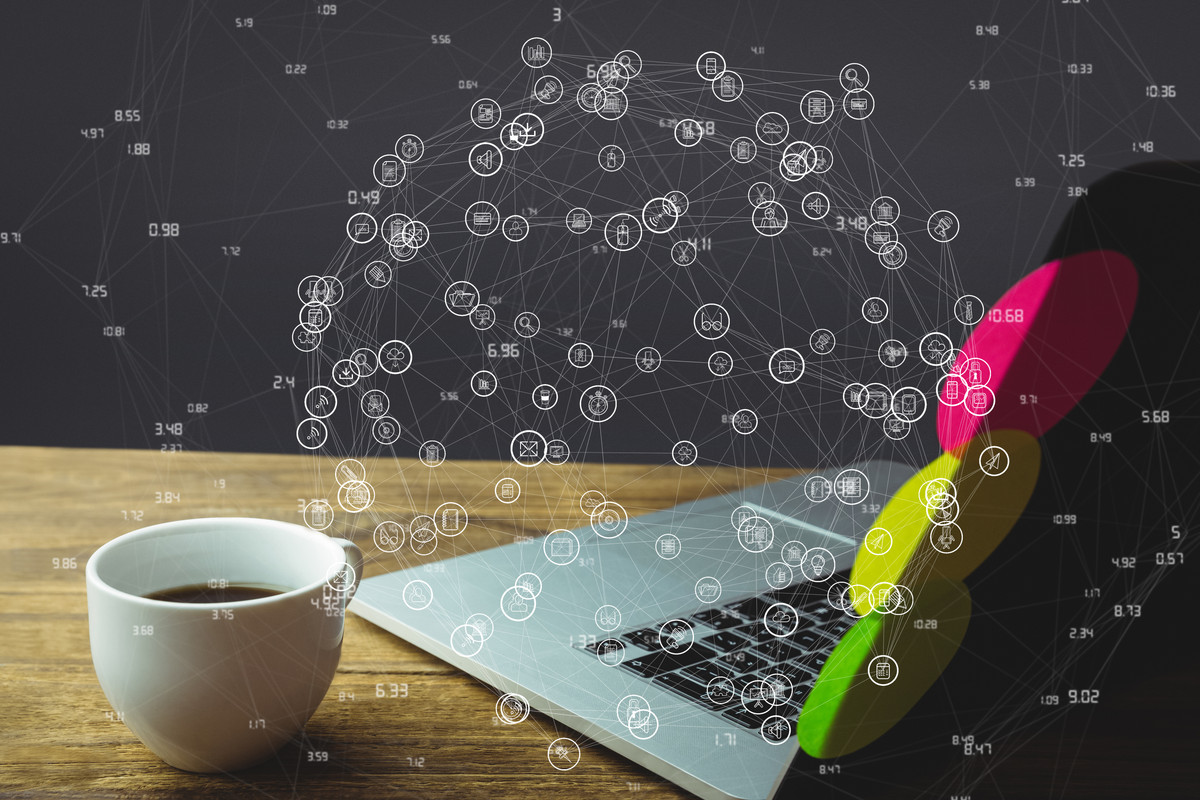 laptop-wooden-desk-with-social-media-diagram