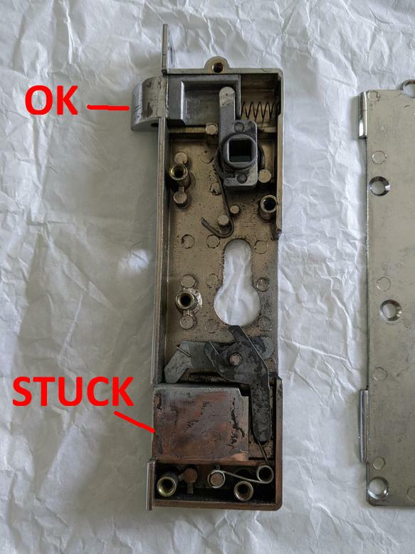 Door stuck due to lock's dead latch not retracting