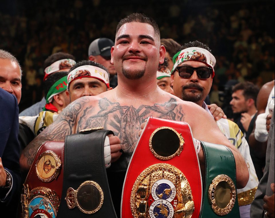 Andy with his title belts