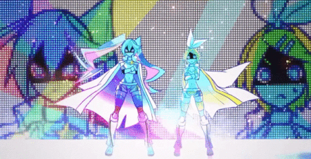 A gif from the 'Seraphim on the Ring' music video by Mitchie M. The gif zooms in on Hatsune Miku and Kagamine Rin staring at the camera menacingly with their arms crossed, half of their faces shadowed with them in their showy white, blue, and yellow wrestling outfits. Their coats, as well as Miku's hair, are billowing in the wind as colourful lights move and shine around them. Behind them is a screen that showcases their faces.