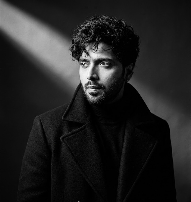 AI-generated example result for the creative-images prompt: Sartorial Black Overcoat Film Portrait Prompt by Prompt Craft