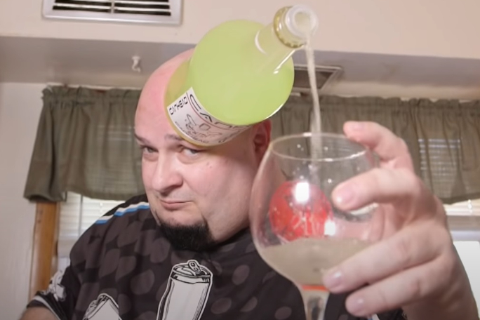 https://i.postimg.cc/xjFjfKz6/jamie-keeton-filling-a-wine-glass-from-a-bottle-stuck-to-his-head-tcm25-710048.jpg