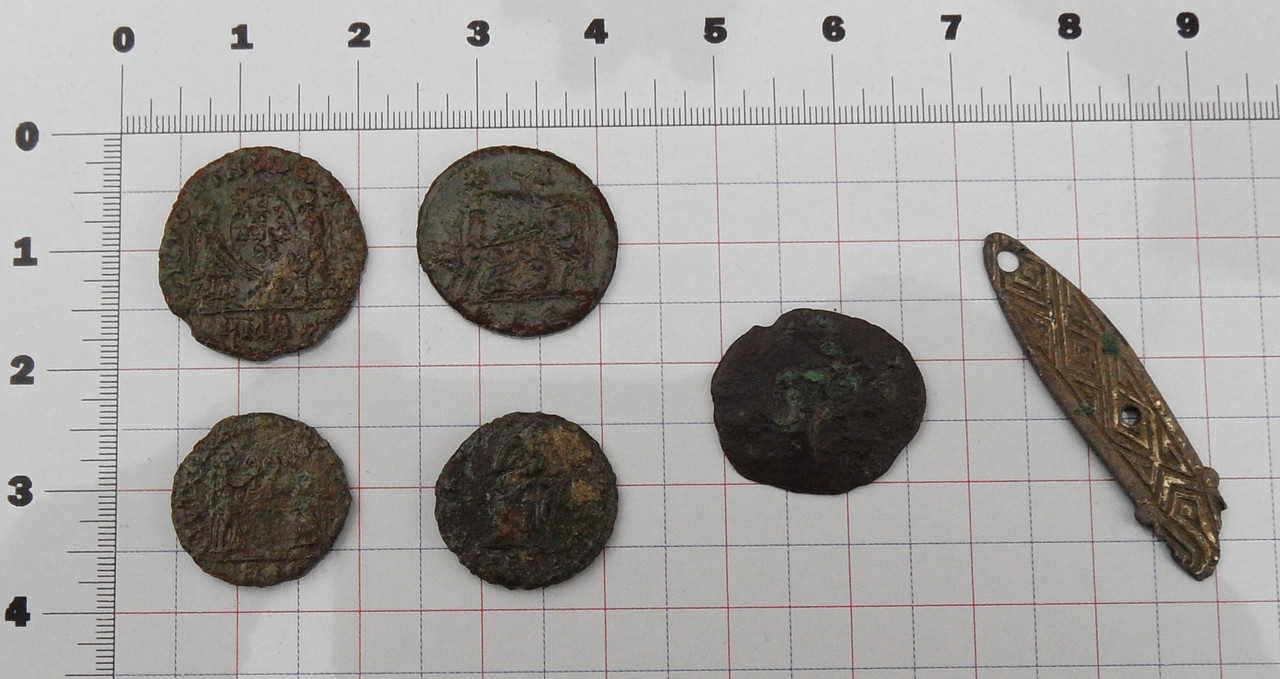 Five Roman coins and a nice gilt strap decoratio