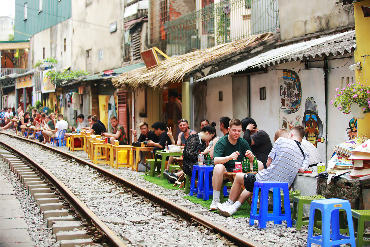 people-beside-train-track.jpg