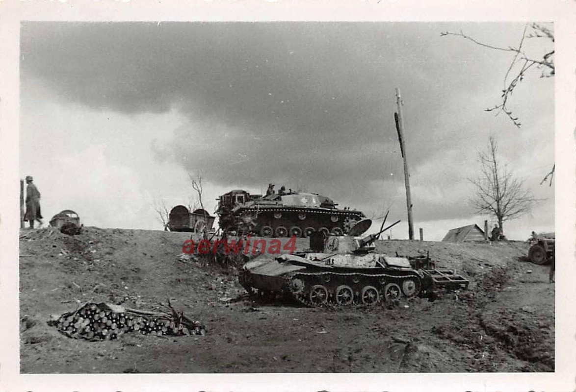 Deutsches Sturmgeschütz III am russ. Panzer T - 