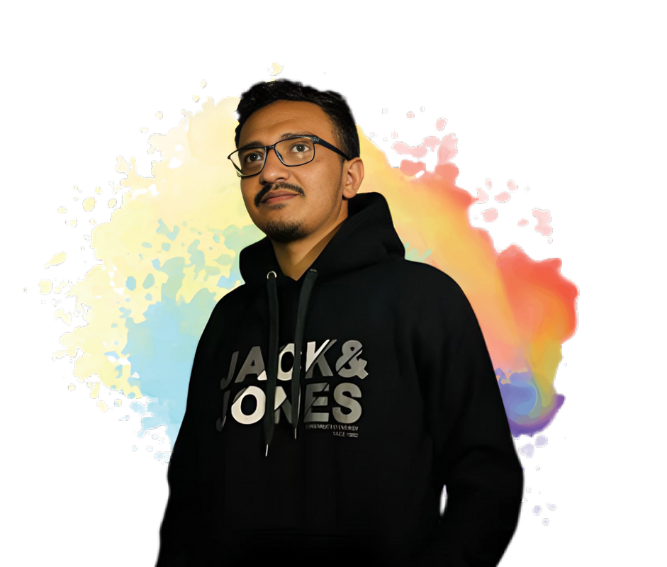 A man in a blue shirt with a happy expression