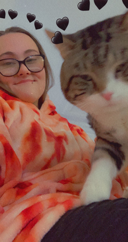 Kiana with her cat, Ash.