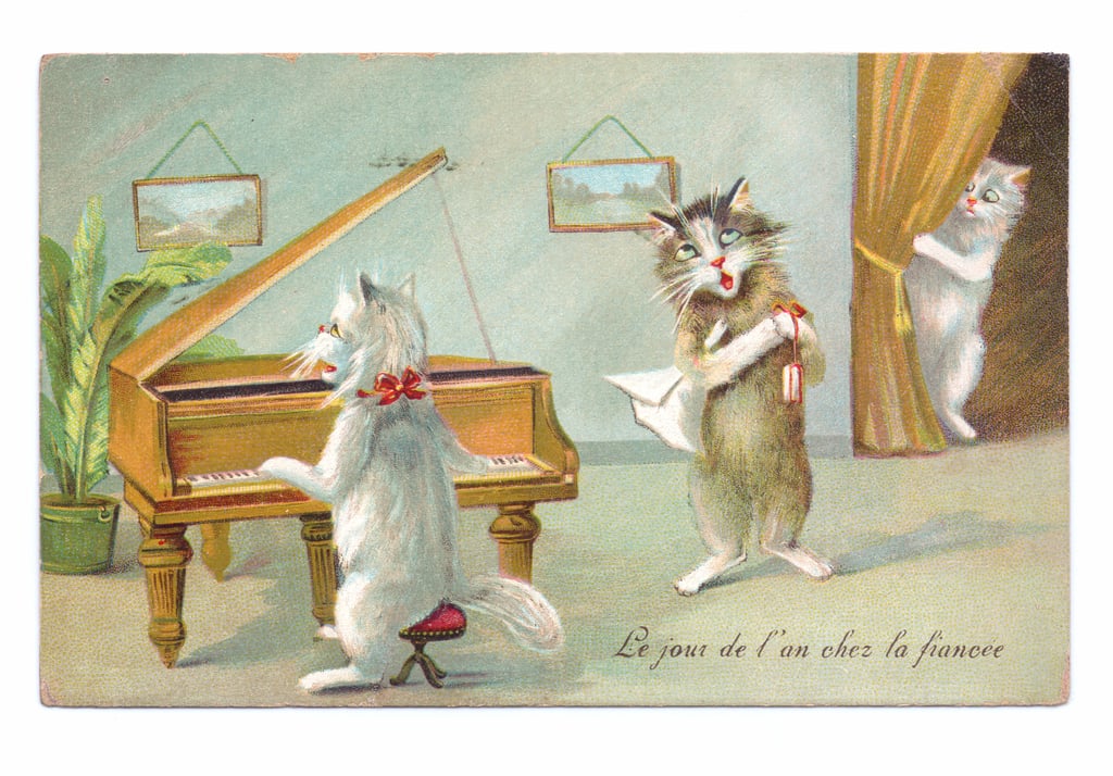 14-Louis-Wain-Edwardian-postcard-of-a-cat-playing-the-piano-and-the-other-singing-while-a-thir