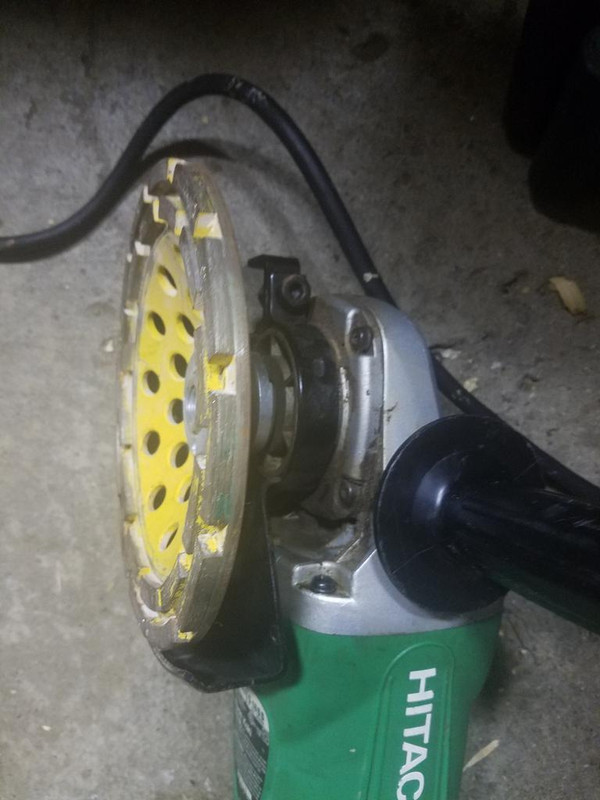 Angle grinder nut stuck with a cup 
