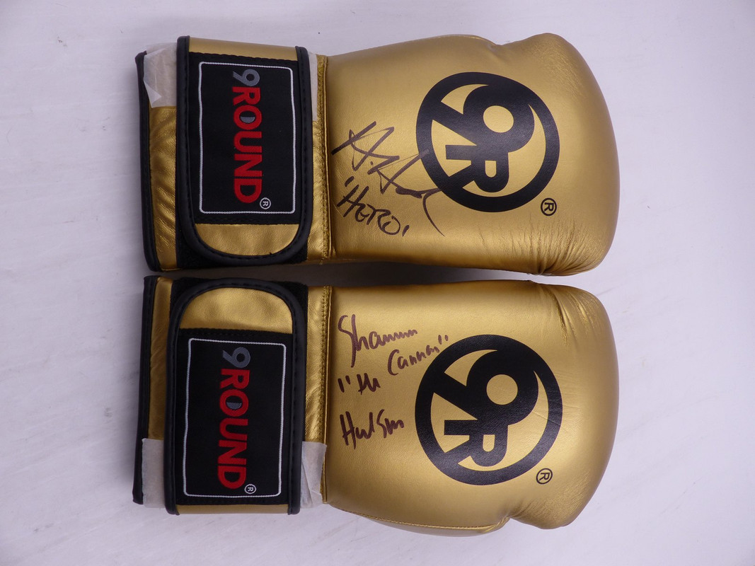 9ROUND GOLD BOXING GLOVES SIGNED "SHANNON 'THE CANNON' "HUDSON"/ + "HERO"