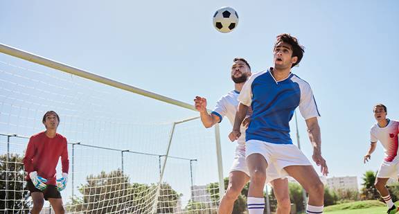 Youth Player Scoring a Goal