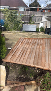 Fence installation before - new fence panels laid flat on ground ready for installation