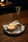 Scotch egg with direct martini pairing