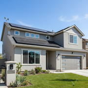 Home with reinforced roof and flood-resistant foundation