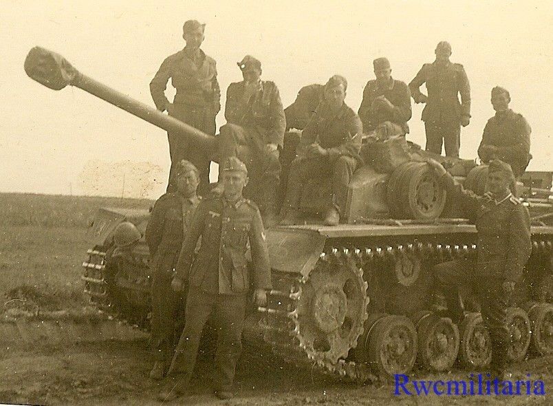 Wehrmacht Troops Posed on Sturmgeschütz Panzer Tank in Field