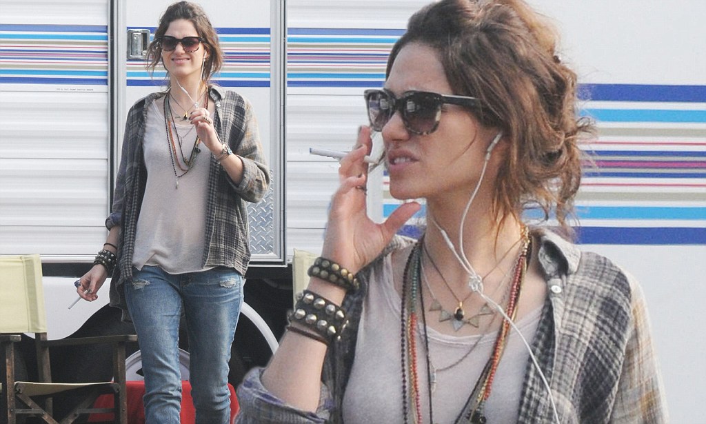 Emmy Rossum smoking a cigarette (or weed)
