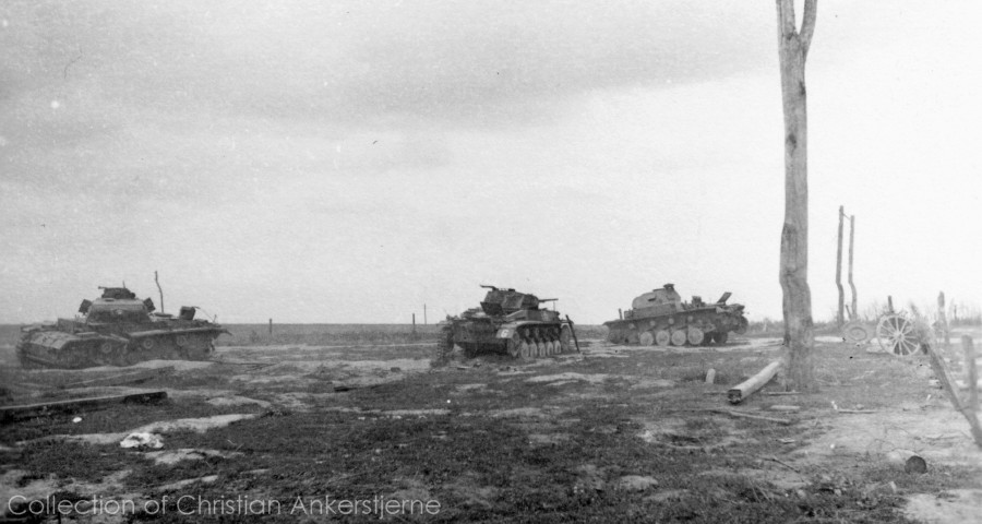 Knocked-out Pz Kpfw III Ausf. G (tactical number 235) and Pz Kpfw II Ausf. C (left-most, tactical nu