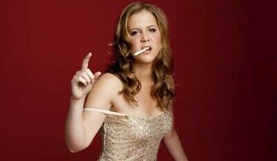 Amy Schumer smoking a cigarette (or weed)
