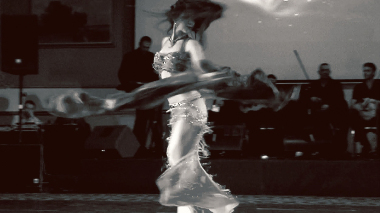 Erene performing with live musicians