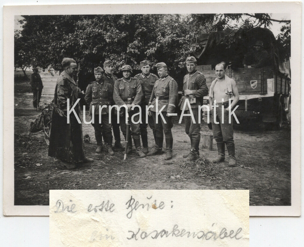 Foto Wehrmacht Russland Front LKW Wappen Beute Kosaken Säbel Schaschka