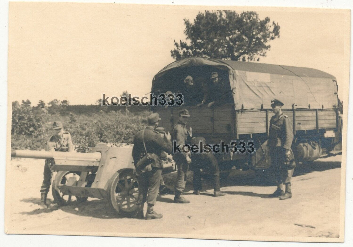 Foto Panzerjäger der Wehrmacht am LKW mit angehängtem 7,5cm PaK Geschütz ...