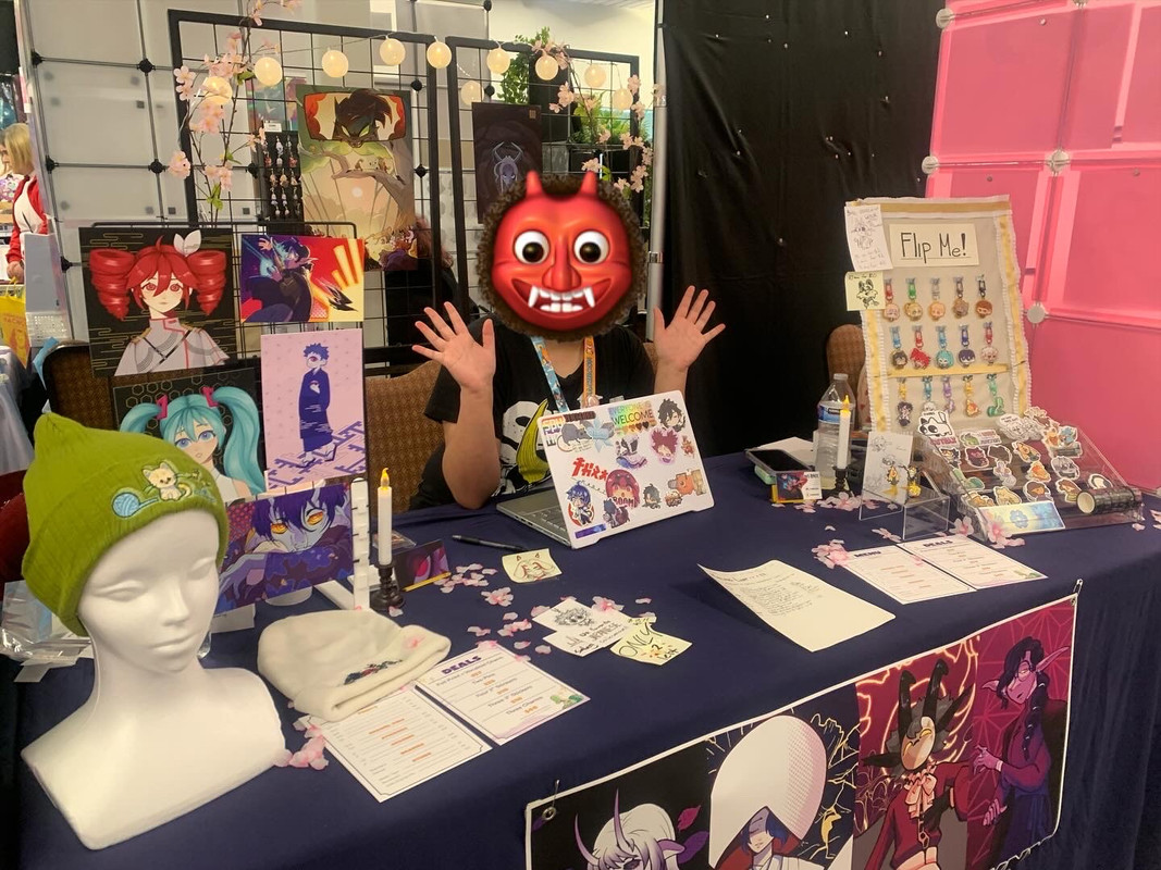 Myself, s0apbro, seated at my artist alley booth that's shared with LenisLynx