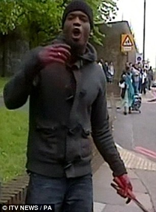 19-F0-EE97000005-DC-0-Video-grab-taken-from-ITV-News-shows-a-Michael-Adebolajo-holding-m-38-15400700917.jpg