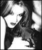 http://img.photobucket.com/albums/v626/AlbinoSquirrel/kinky%20icons/girlwithgun.jpg