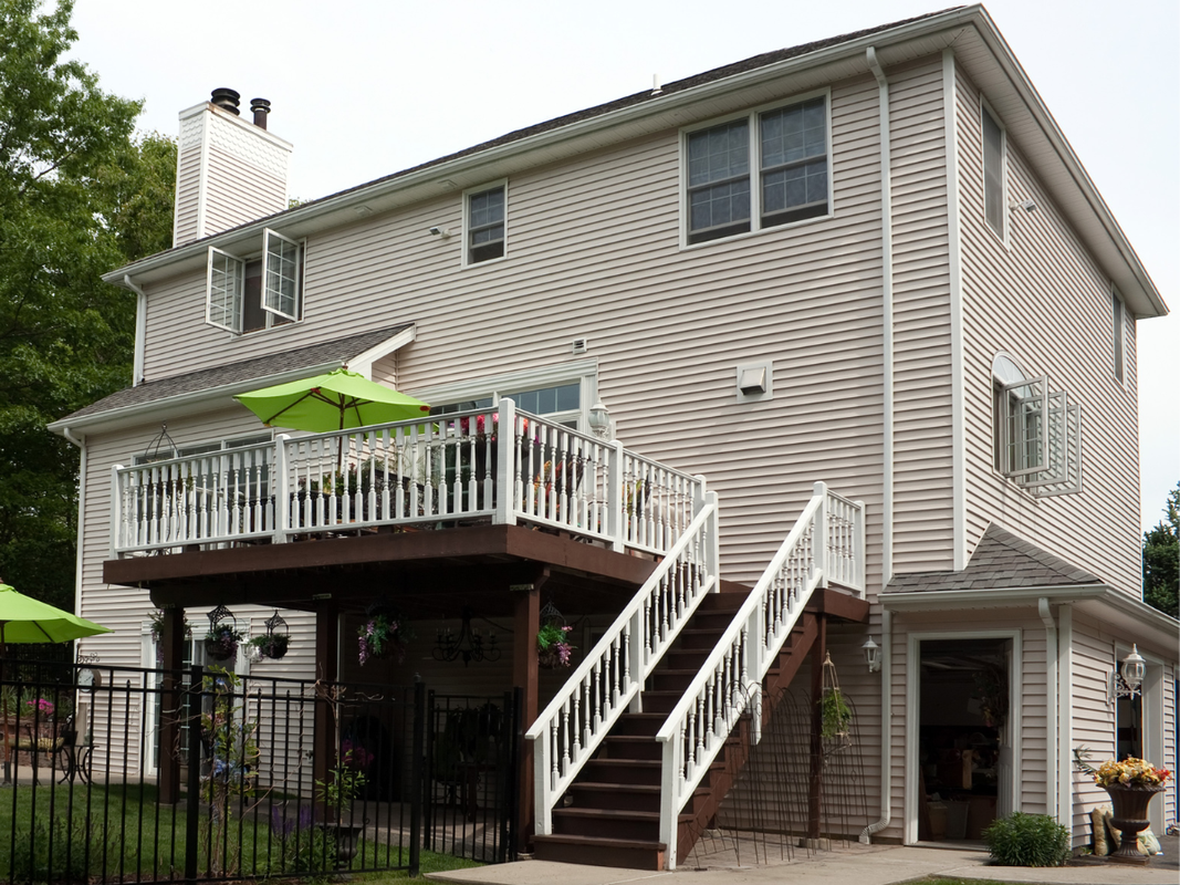 Luxury multi-level deck with outdoor living space