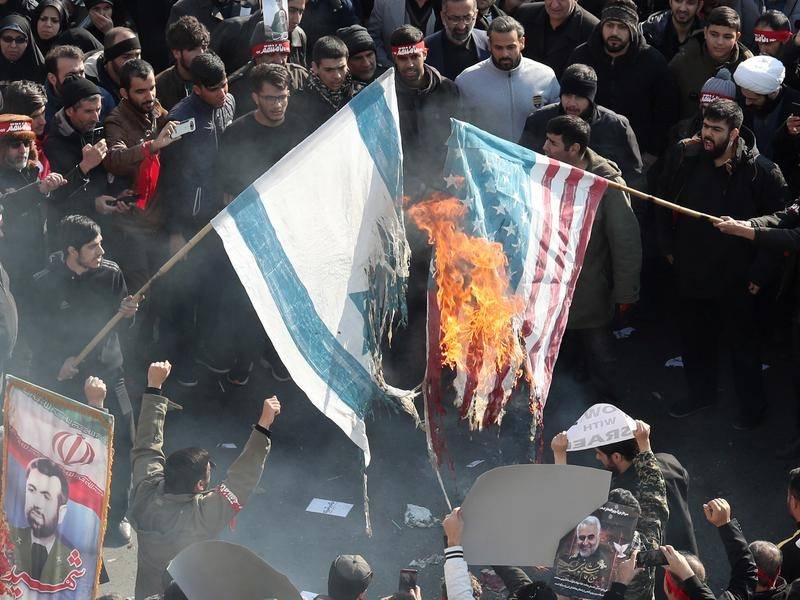 Iranian Official Calls on Students to Burn and Trample French, Israeli, and American Flags at Home