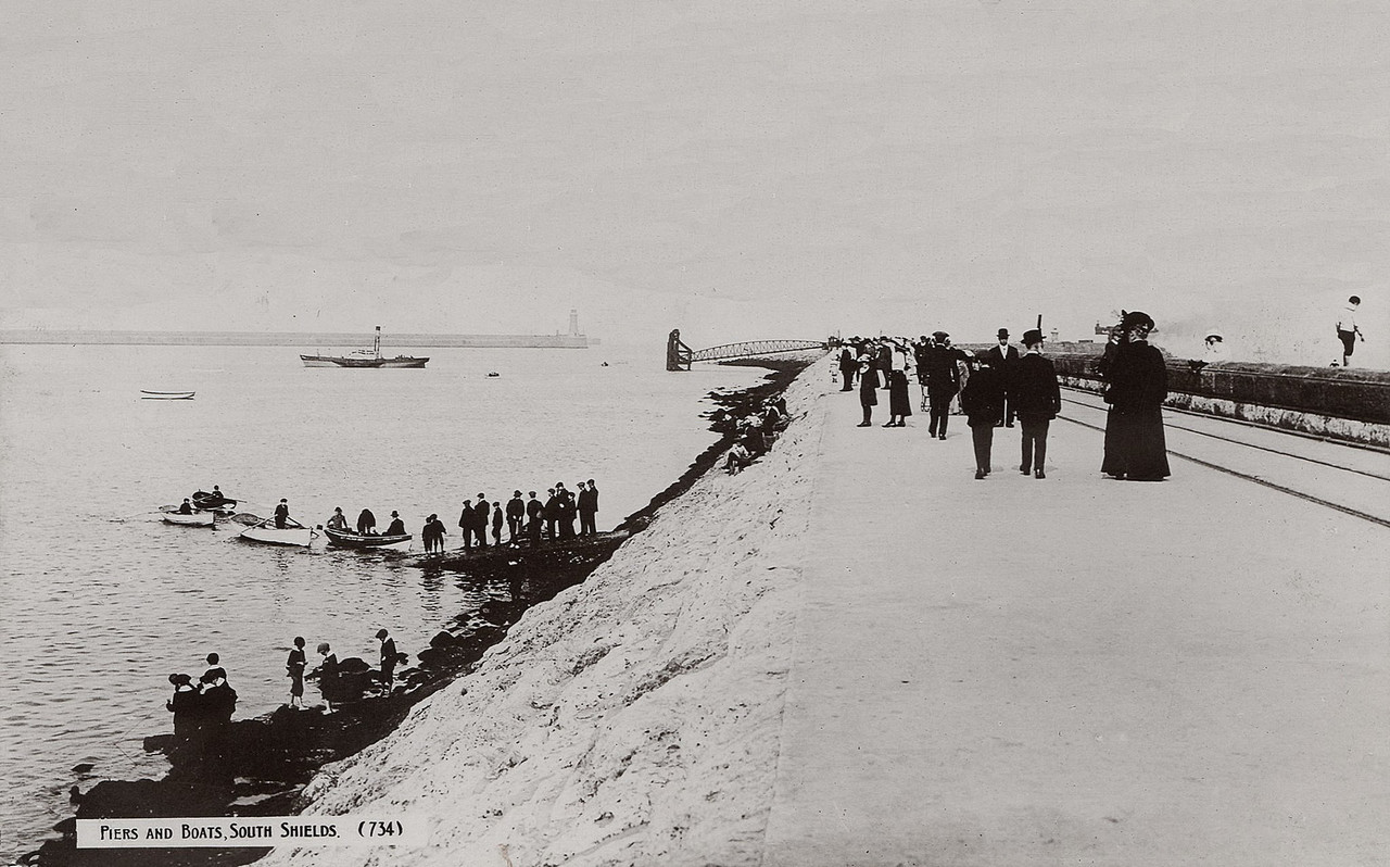 Piers and boats postcard photo dated (posted) 24th September 1912