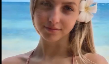 This Girl Is Standing In A Pink Bra, Showing Off Her Big Boobs.