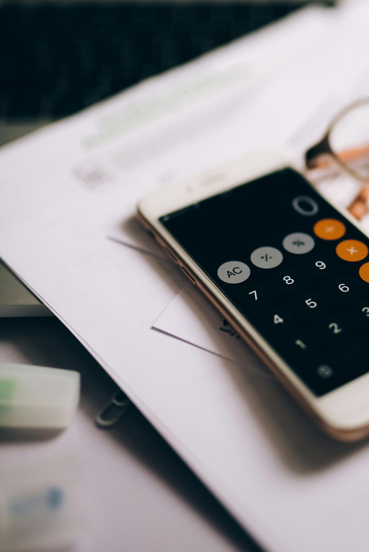 Person analyzing audience insights on laptop