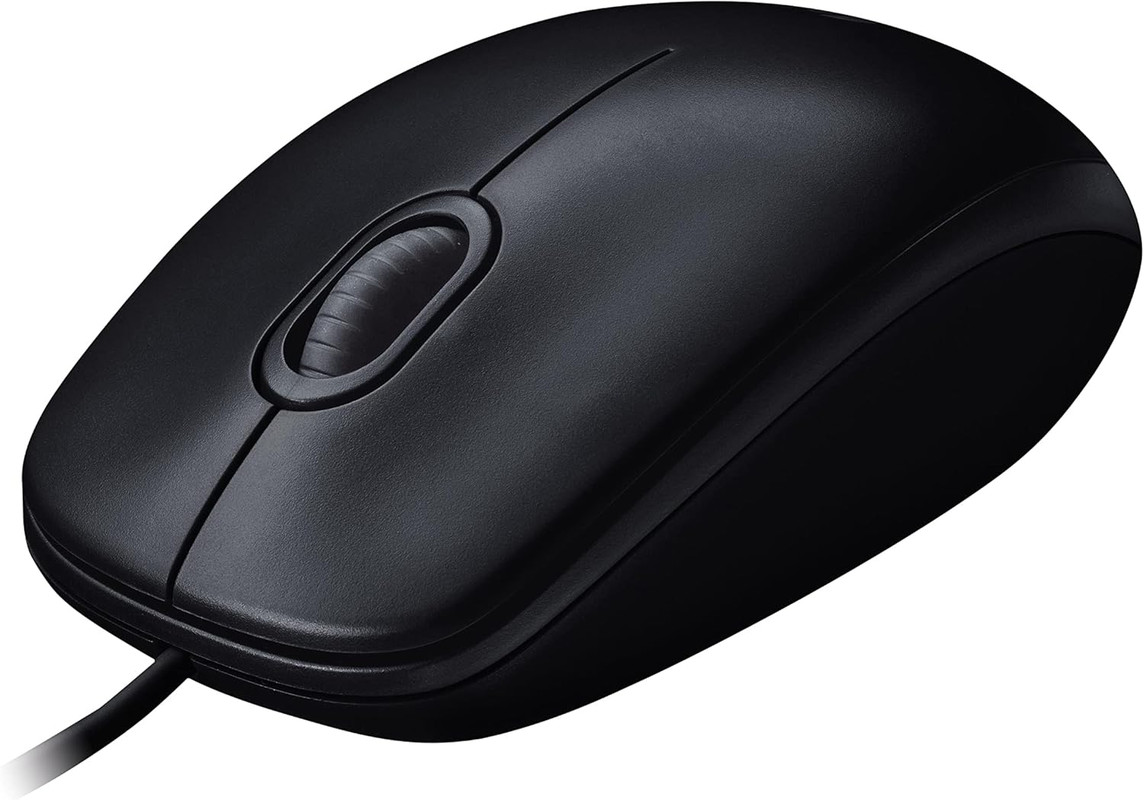 Mouse Logitech M90 USB en un escritorio de trabajo.
