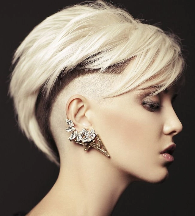 Shaved short hairstyle with the top layer being the longest