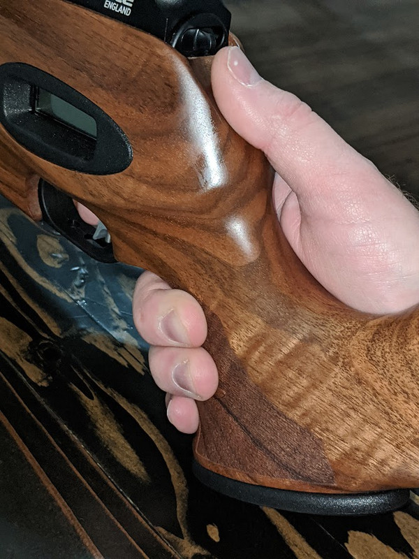 grip and thumb groove