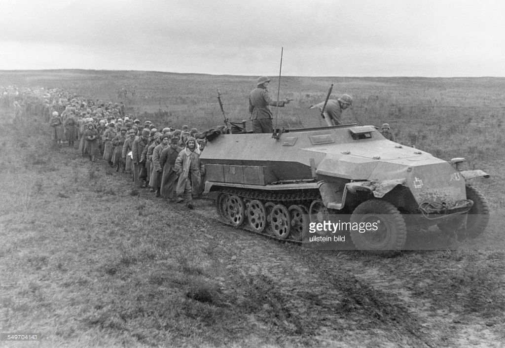 german apc (sdkfz 251) leading a long queue of s