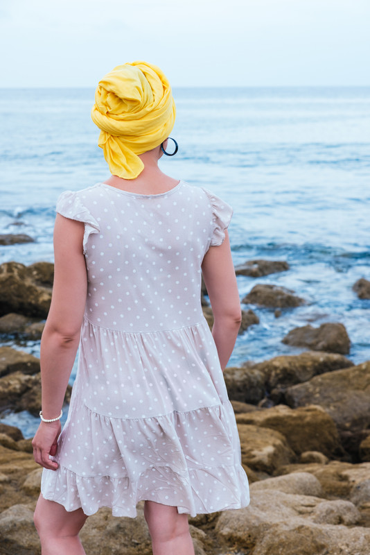 C:\Users\lenovo\Pictures\Saved Pictures\muslim woman\selective-focus-shot-young-female-relaxing-seaside.jpg